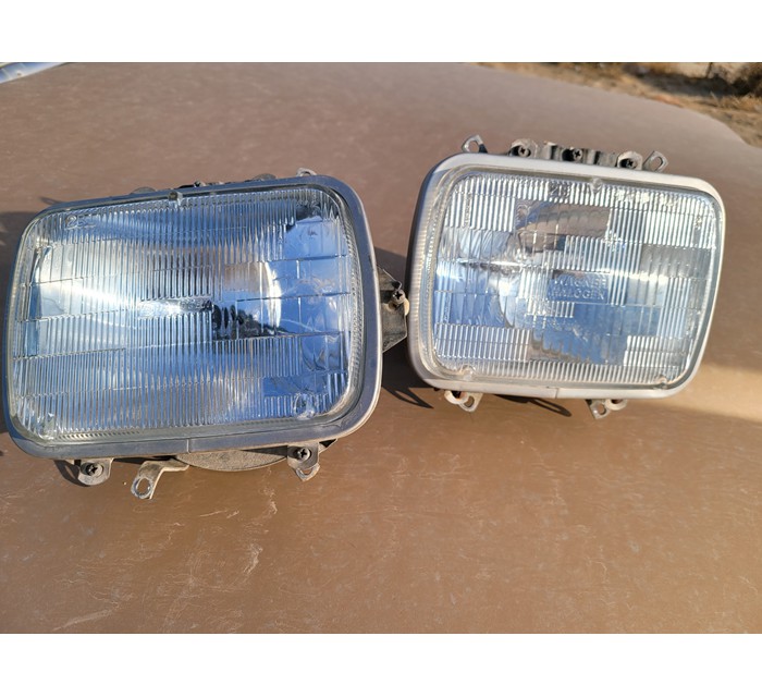 Headlights with buckets and mounting hardware