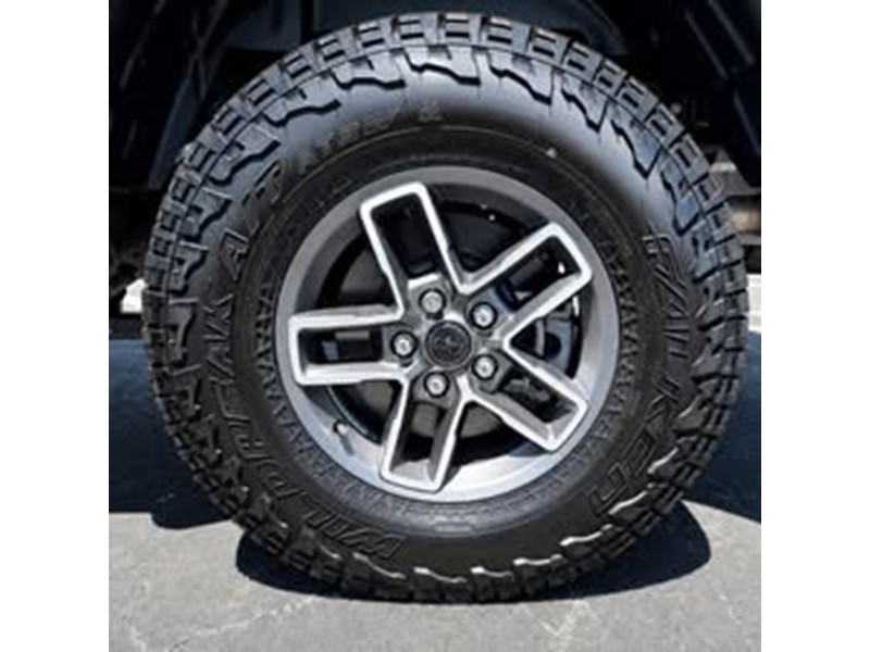 2026 Jeep Gladiator Mojave X LT285-70R17-C Tires and OEM factory wheels and Rock Rails 4