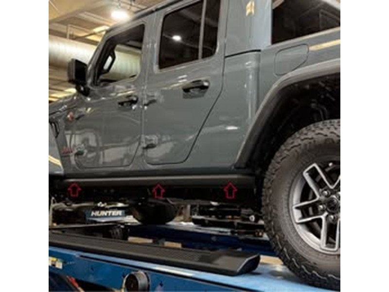 2026 Jeep Gladiator Mojave X LT285-70R17-C Tires and OEM factory wheels and Rock Rails 5